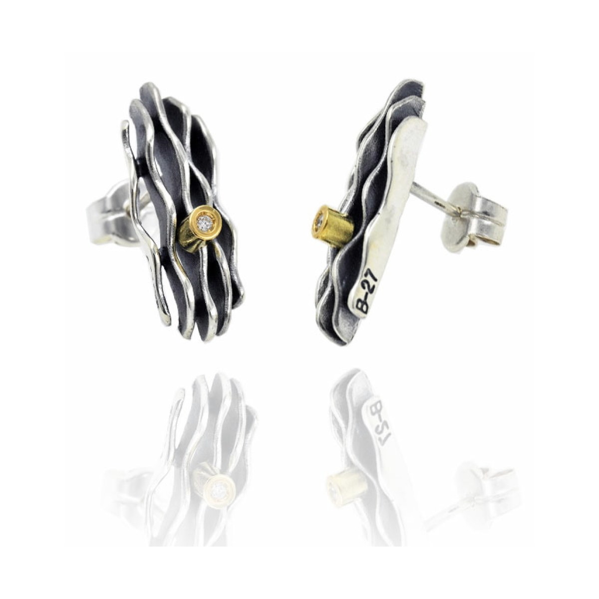 Medium silver and gold Fi earrings van Arior Barcelona